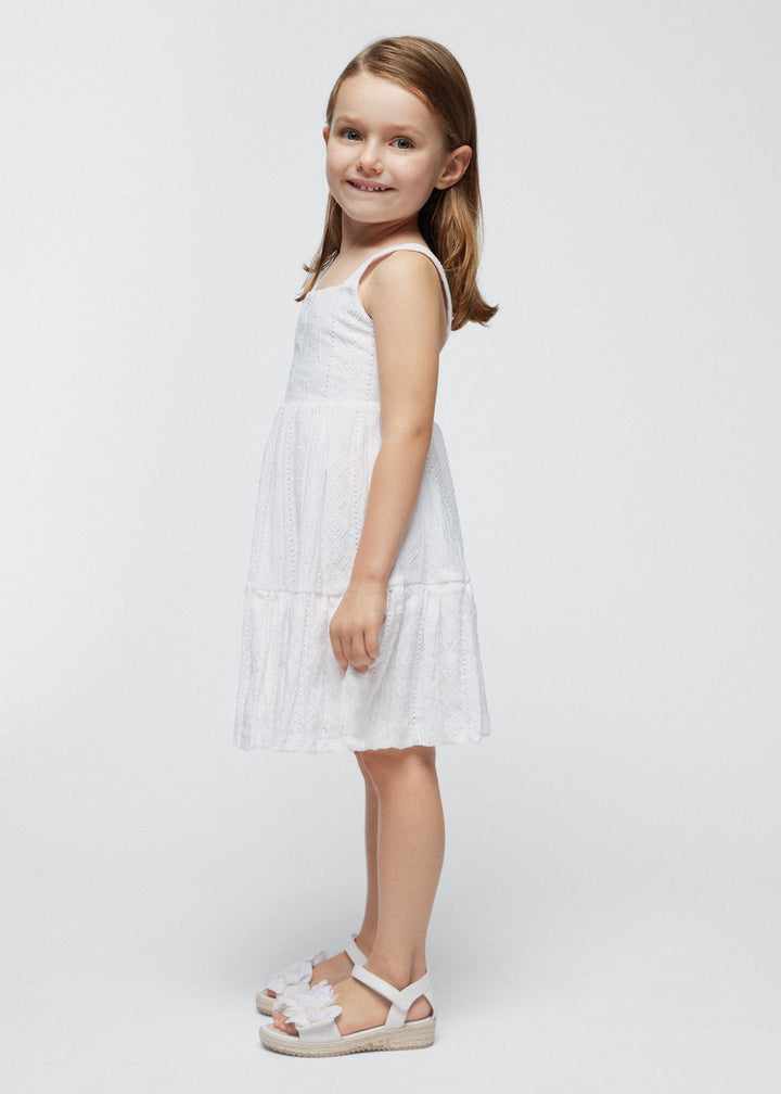 Mayoral Dress White - "Elegant white sleeveless dress with textured fabric and bow detail at waist by Mayoral.