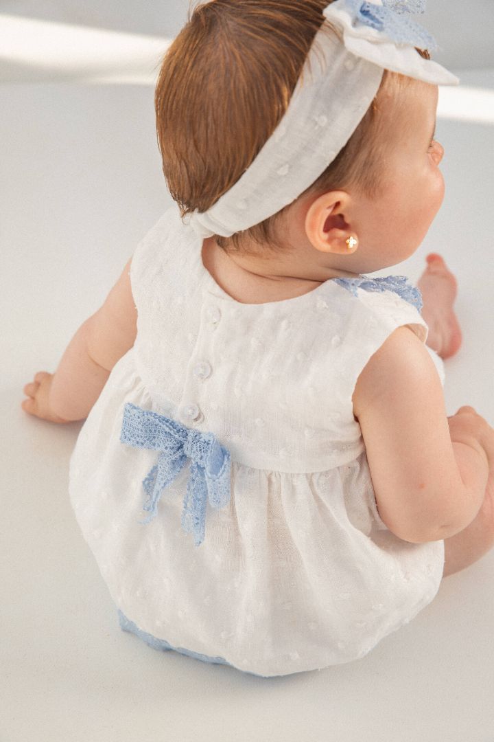 Chemical white Aikido baby woven dress and matching briefs set, designed for comfort and cuteness with delicate detailing.