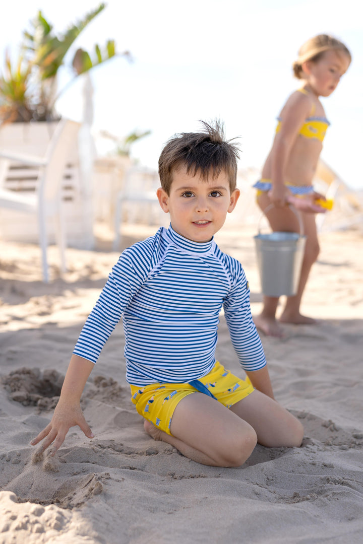 A casual yet stylish knitted T-shirt in atlantic blue from Tutto Piccolo, featuring a relaxed fit and a subtle design, ideal for versatile summer wear for children.