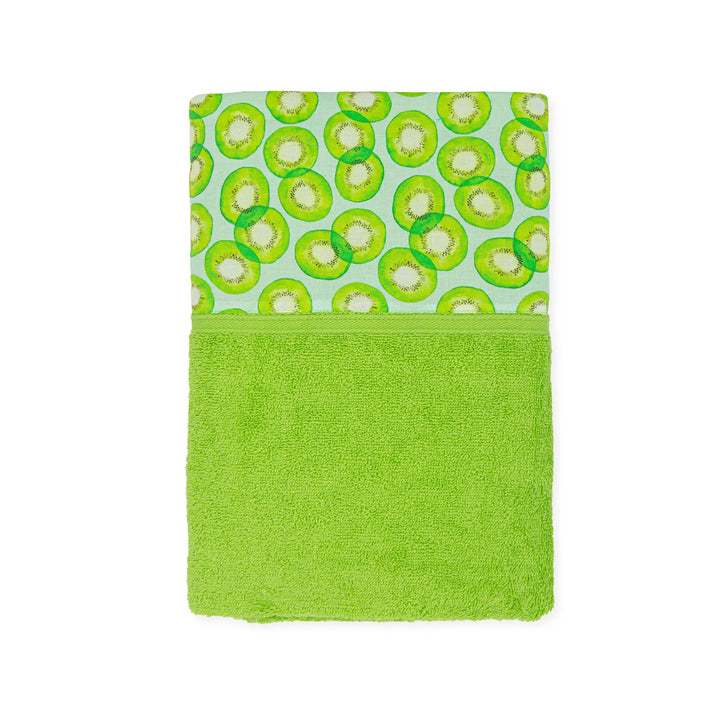 A vibrant lime green knitted towel from the Tutto Piccolo summer collection, featuring a playful kickball theme, perfect for children's beach or bath time.