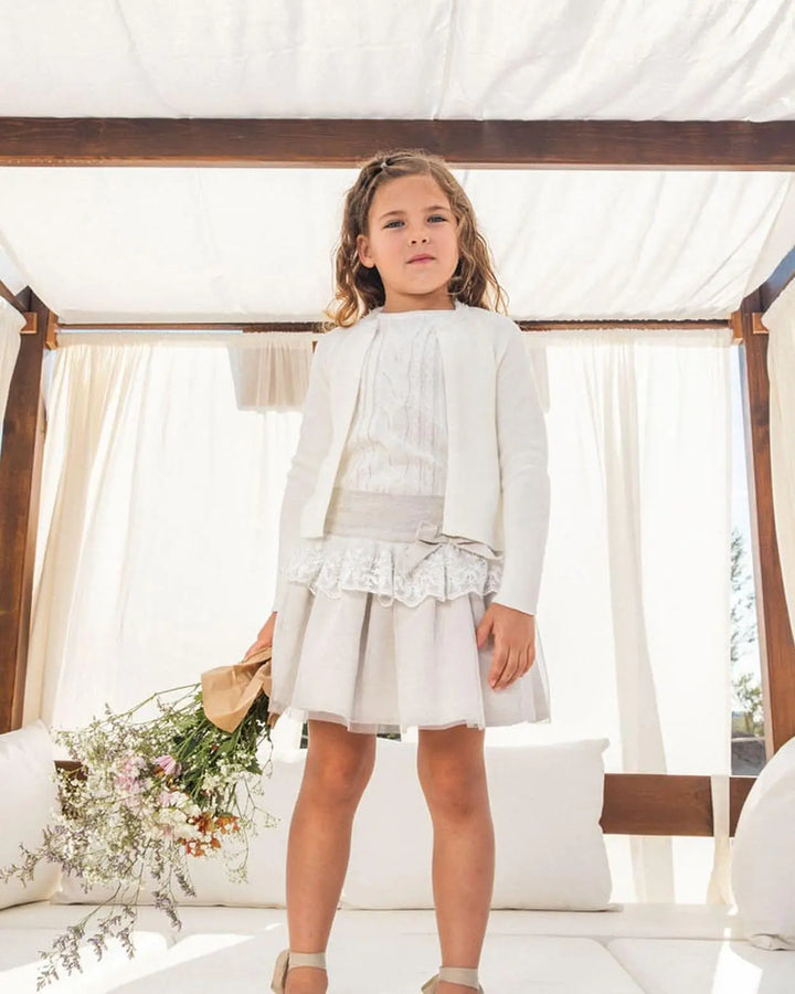 Chemical white Kendo knitted jacket for children, combining warmth and style with a soft, textured design.