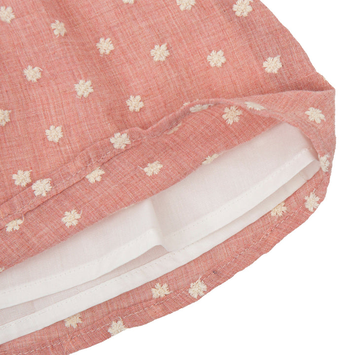 Petal pink Kendo baby woven dress with matching briefs set, featuring a delicate and soft design ideal for summer, adorned with subtle detailing for a touch of elegance.