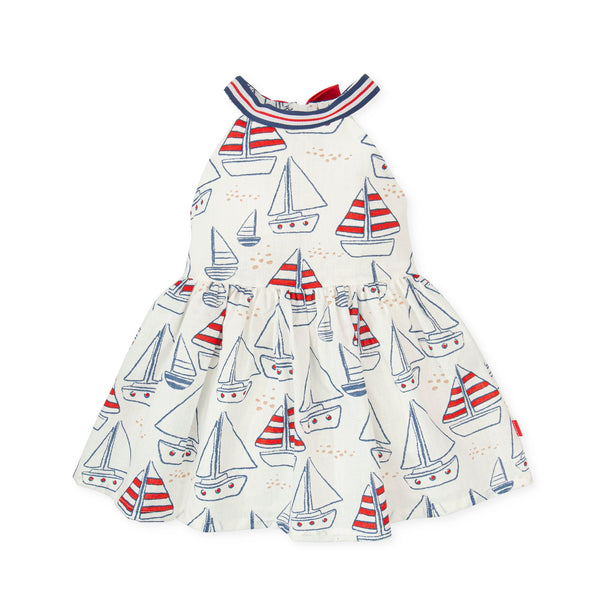 A sophisticated navy blue woven dress from the Tutto Piccolo baby girl collection, featuring a timeless design with a comfortable fit, ideal for special occasions or everyday elegance.