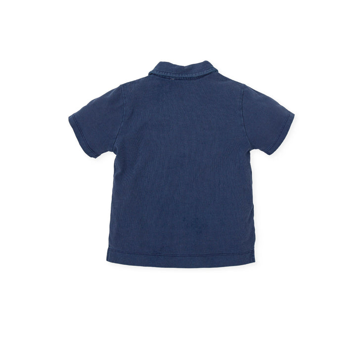 An atlantic blue knitted polo neck from Tutto Piccolo, designed for boys, featuring a comfortable fit and a sophisticated look, suitable for both casual and formal settings.